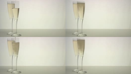 香槟:两杯半满的香槟高清在线视频素材下载