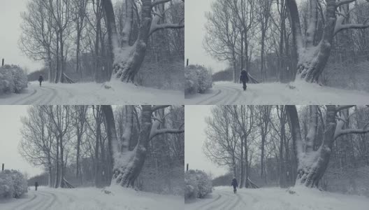 冬天下雪的山城街道上有行走的妇女，村庄下雪灾难。高清在线视频素材下载
