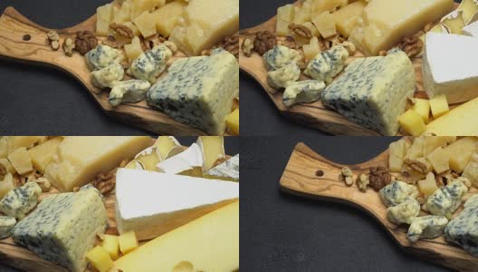 各种类型的奶酪-布里干酪，卡门贝尔干酪，羊乳干酪和切达干酪高清在线视频素材下载