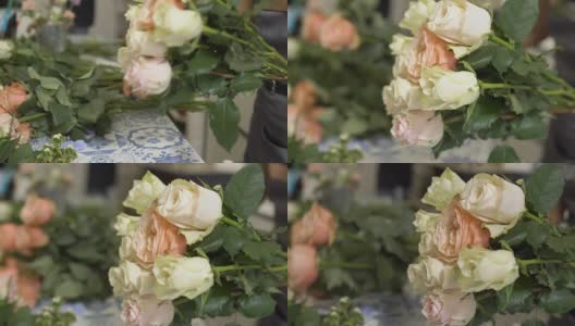 花店老板在花店里做了一束玫瑰高清在线视频素材下载