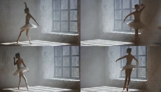 专业芭蕾舞演员在有大窗户的房间里表演脚尖旋转高清在线视频素材下载