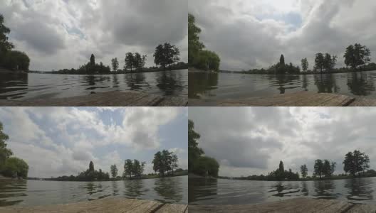 快速视频时光流逝景观码头，河流，天空，云朵，树木，夏天。高清在线视频素材下载