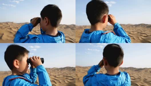 一个小男孩在沙漠里用望远镜看高清在线视频素材下载