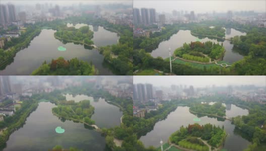 白天武汉市紫阳公园湖泊航拍全景图4k倾斜移位中国高清在线视频素材下载