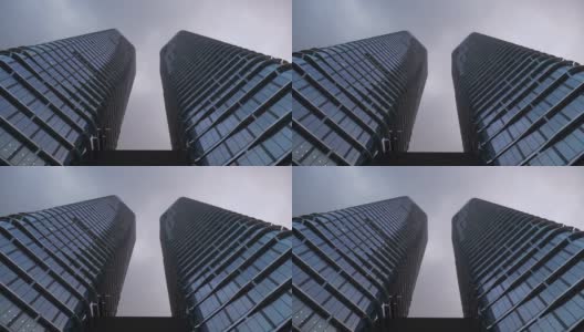 多云的天空成都市现代办公大楼耸立，一览4k中国全景高清在线视频素材下载