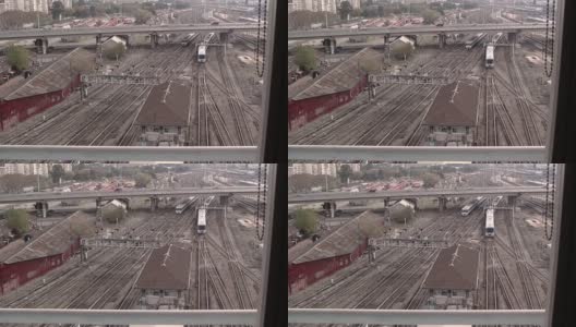 铁路轨道和Umberto Illia高架桥高速公路与快速驾驶的汽车在雷蒂罗社区，布宜诺斯艾利斯，阿根廷。高清在线视频素材下载