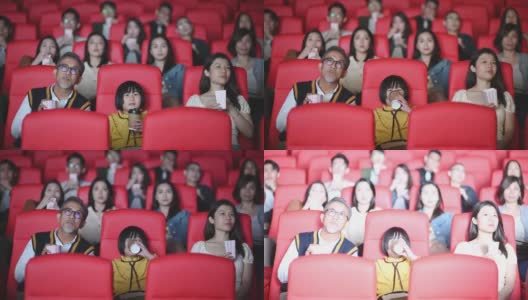 一位活跃的亚洲华人老人和他的孙女喜欢在电影院看电影高清在线视频素材下载