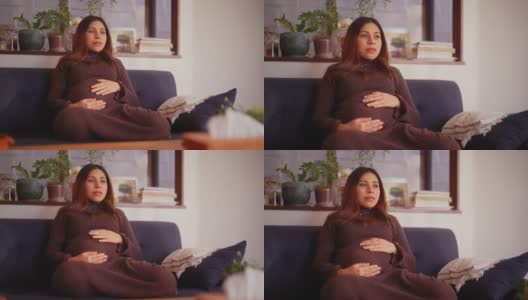 孕妇在家的肖像高清在线视频素材下载