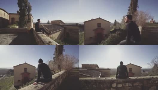 托斯卡纳的一个乡村里，一名男子正在享受阳光高清在线视频素材下载