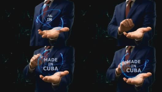 商人在手上展示古巴制造的概念全息图高清在线视频素材下载