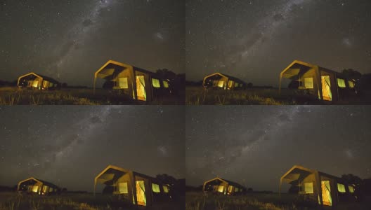 在博茨瓦纳的一个狩猎营地，恒星延时拍摄，银河系在夜空中移动高清在线视频素材下载