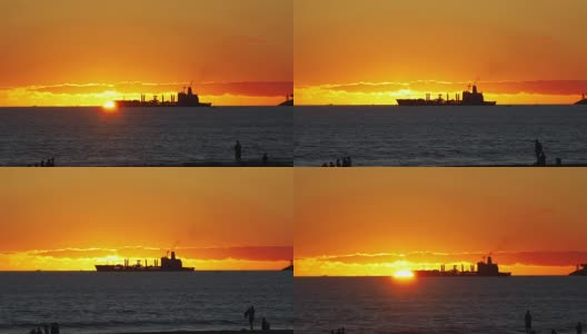 在4k慢镜头的夕阳下，一艘集装箱货轮在海上航行高清在线视频素材下载