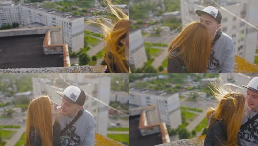 幸福年轻漂亮时髦的夫妇在屋顶上接吻高清在线视频素材下载