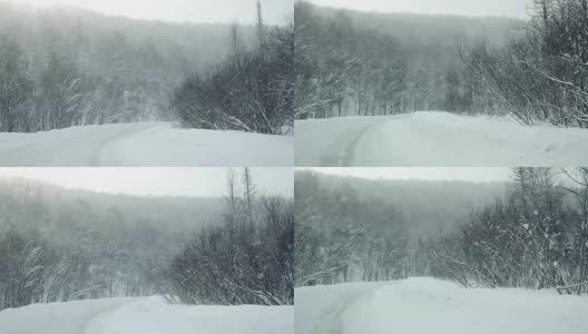 在下雪的时候，汽车在美丽的雪地上缓慢行驶。1920 x1080高清在线视频素材下载