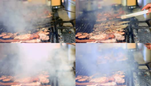 厨师烧烤虾，鱼和龙虾在烧烤高清在线视频素材下载