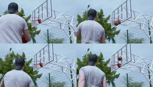 运动员在篮球场的环形场地上投球高清在线视频素材下载