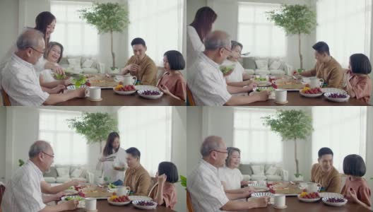 亚洲大家庭在家里吃团圆饭高清在线视频素材下载