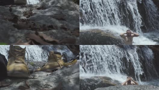 男鞋踩在山间瀑布的石头上。游客在山间瀑布中沐浴。英俊的男子在热带雨林享受新鲜的山河高清在线视频素材下载