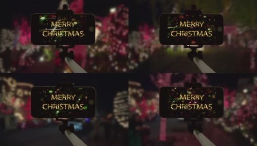 纽约(New York)的智能手机自拍灯在圣诞节的移动之夜点亮高清在线视频素材下载