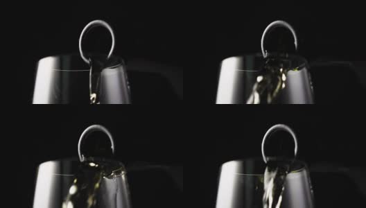 慢镜头将香槟倒入玻璃杯高清在线视频素材下载