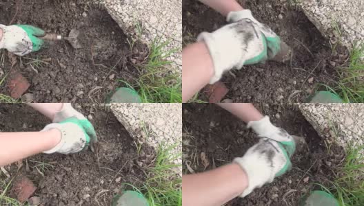 园丁在花园里挖了一个洞来种花高清在线视频素材下载