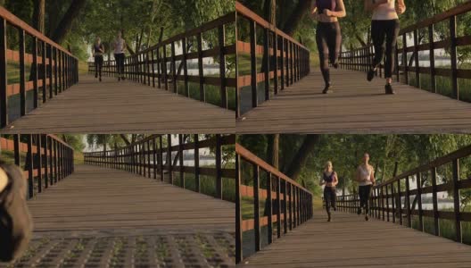 两个年轻漂亮的女跑步者马尾辫在公园大桥上慢跑，减肥，健身模特跑步高清在线视频素材下载