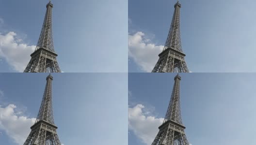 象征法国和巴黎的埃菲尔铁塔映衬着蔚蓝的天空高清在线视频素材下载