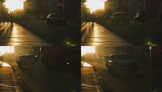 夕阳下的行人和汽车在哈瓦那的剪影高清在线视频素材下载