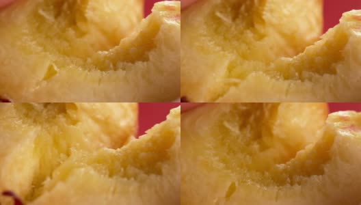 熟透多汁的桃子切成两半。大特写镜头高清在线视频素材下载