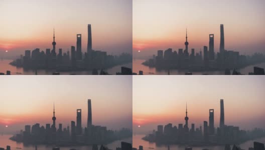 空中鸟瞰日出时的上海天际线高清在线视频素材下载
