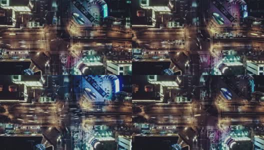 T/L PAN无人机夜间城市街道十字路口的视角高清在线视频素材下载
