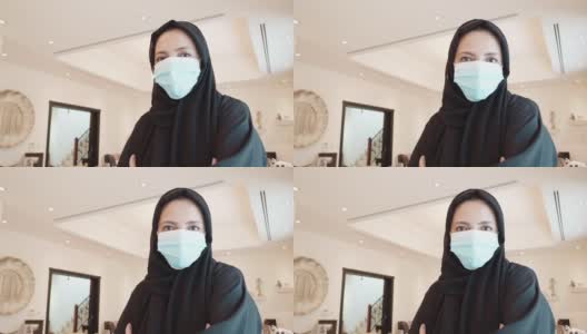一个阿拉伯女人在他的豪华别墅的视频肖像高清在线视频素材下载