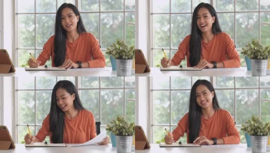 亚洲妇女在家里用笔记本电脑进行视频会议。新常态办公生活理念高清在线视频素材下载