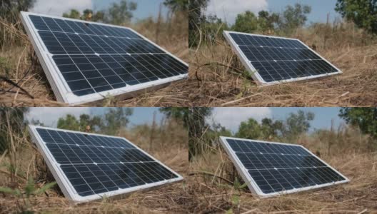 便携式太阳能电池板安装在地面和发电室外高清在线视频素材下载