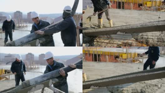 工人们在建筑物顶部浇筑混凝土高清在线视频素材下载