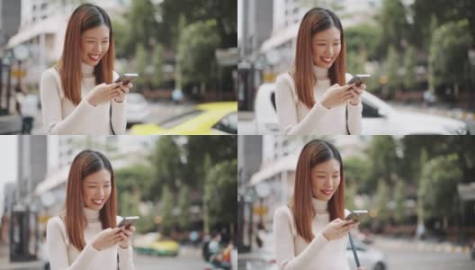 亚洲女人使用智能手机高清在线视频素材下载