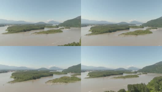 鸟瞰图的河流在山谷包围的加拿大山地景观。高清在线视频素材下载