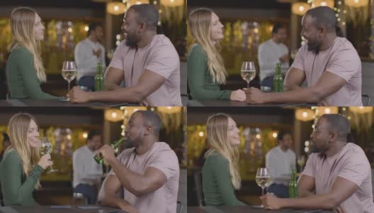 一个男人和一个女人在酒吧约会的滑动镜头高清在线视频素材下载