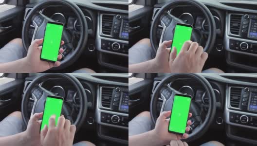 男人的手使用chromakey手机空绿色屏幕在现代汽车。模型触摸屏。滚动的智能手机显示特写。高清在线视频素材下载