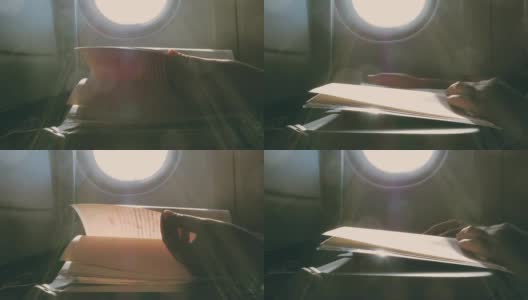 乘飞机旅行:亚洲女性读书高清在线视频素材下载