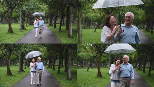 快乐的中国老年夫妇一起在雨中散步高清在线视频素材下载