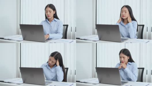一段女商人在办公室用电脑工作时看起来很焦虑的4k视频高清在线视频素材下载