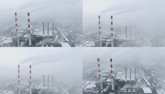 在多雾的冬天，热电厂的顶视图。高清在线视频素材下载