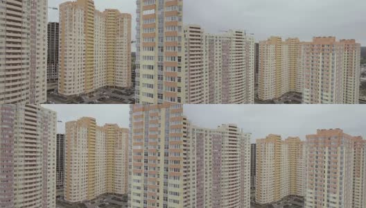 鸟瞰图。城市中新建的高层公寓楼的综合体。摄像机移开了高清在线视频素材下载
