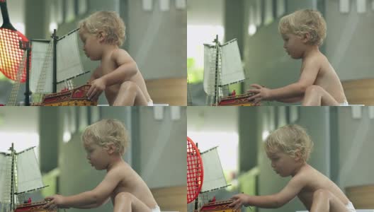 婴儿学步玩海盗船玩具在4k帧速60秒慢动作高清在线视频素材下载