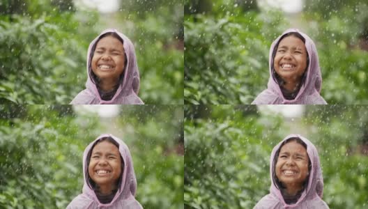 快乐的女孩穿雨衣高清在线视频素材下载