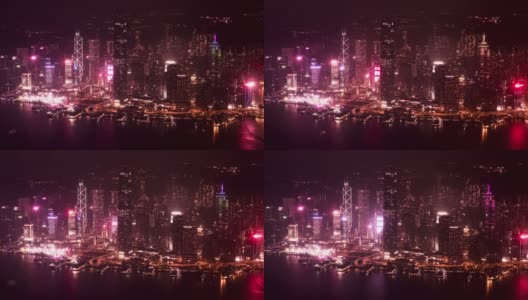从Sky100摩天大楼俯瞰中环金融区和天星码头的迷人夜景高清在线视频素材下载