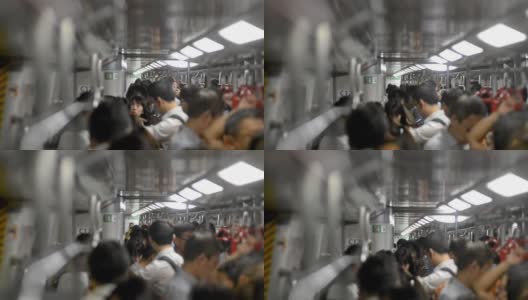 在香港机场的地铁里，一群不知名的亚洲人高清在线视频素材下载