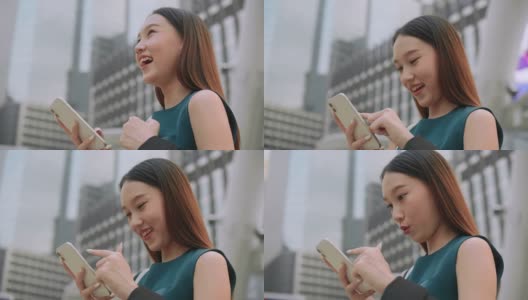 年轻的亚洲妇女接受好消息消息高清在线视频素材下载