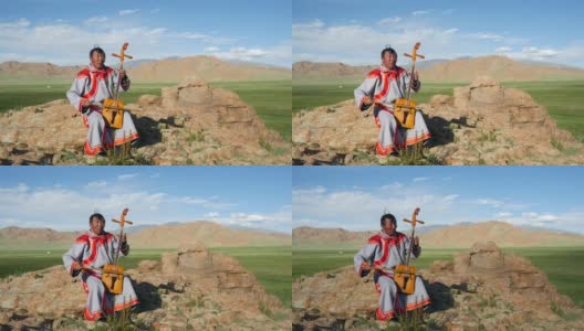 蒙古族传统喉歌手在西部阿尔泰山附近的户外练习高清在线视频素材下载